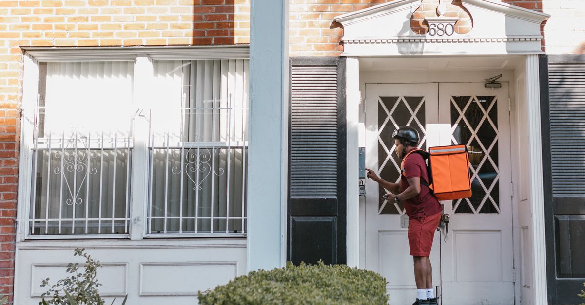 locksmith unlocking front door — Quick Call Locksmith